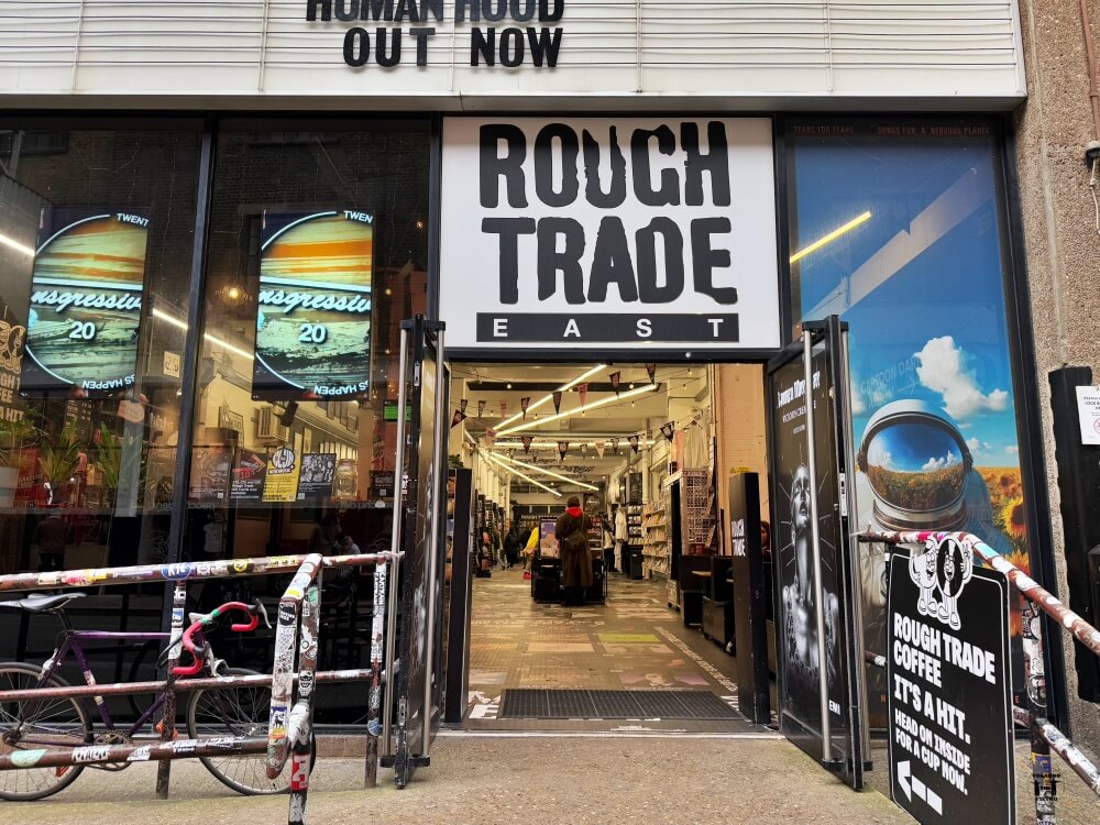 Cartel de la tienda por fuera 